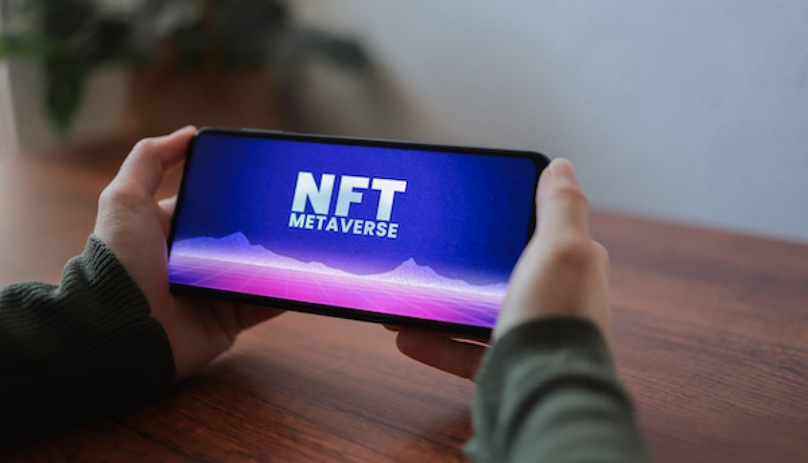 Trader buying NFT on metaverse market using cryptocurrency exchange app - Focus on mobile phone screen
