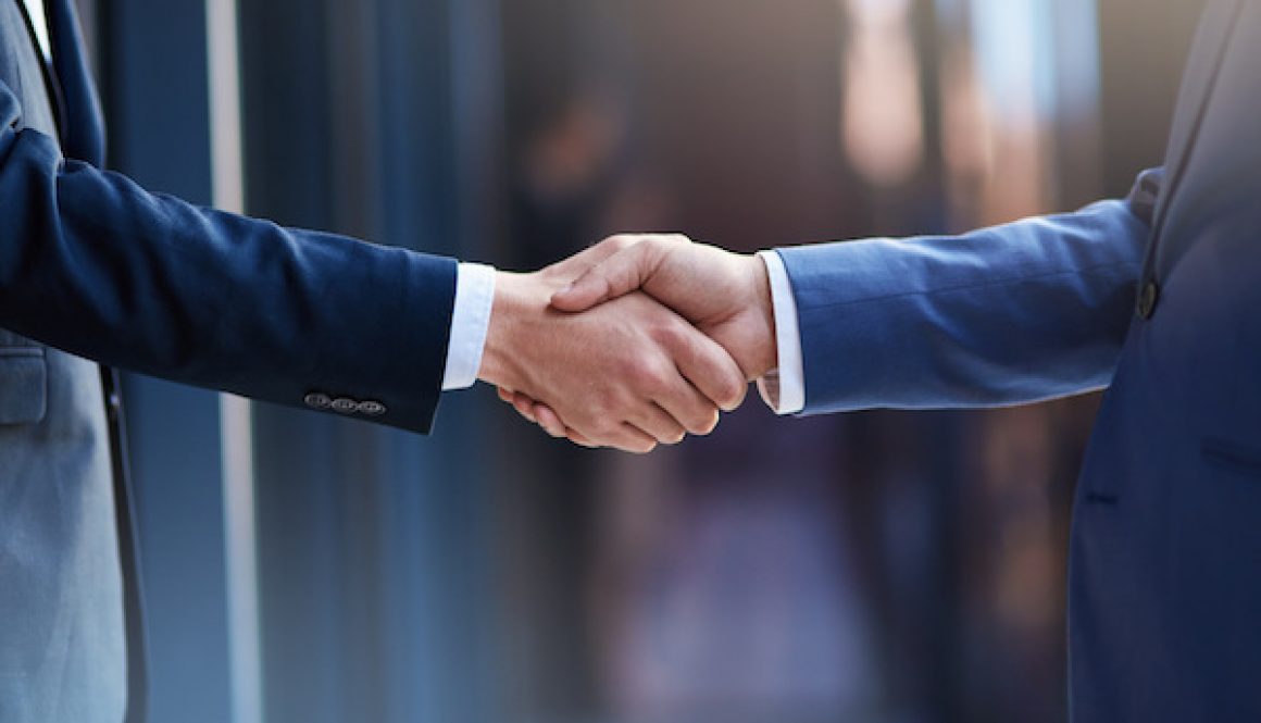 Business collaborations. Cropped shot of two businessmen shaking hands